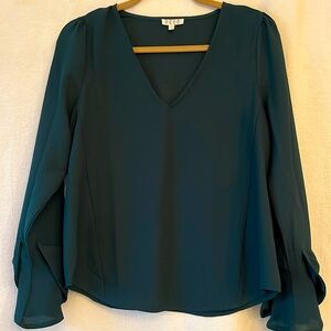 Dark green blouse size small. V-neck with cute bow detail at cuffs.